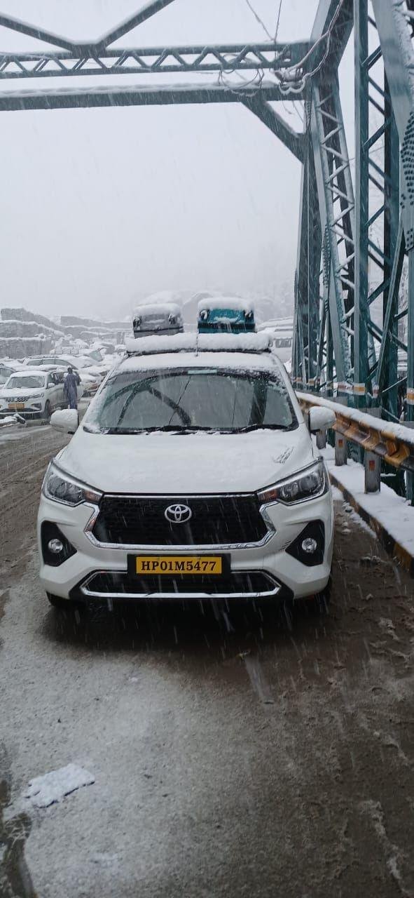 Rumion crossing a bridge in snowfall